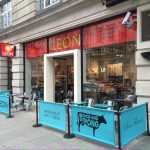 Leon Restaurant - Turquoise Canvas Cafe Banners with Black Powder Coated Advance Café Posts