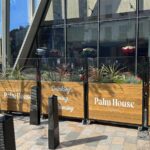 Wooden Baylis Screen Planters on Castors with Stencilled Logo - Installation at Palmhouse, London