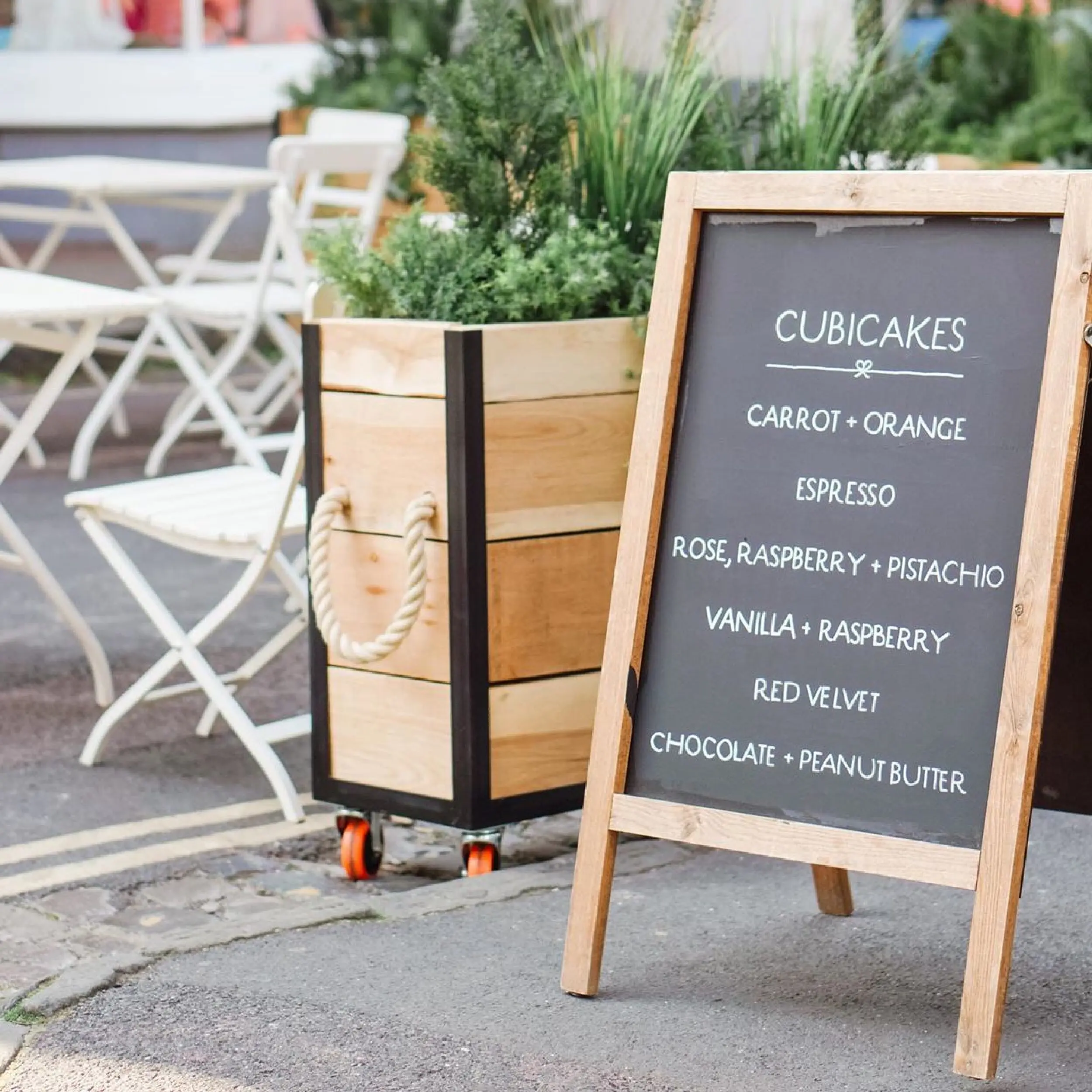 Anna Couture 2 - Baylis Industrial Cafe Planter Baylis Industrial Wooden Cafe Planter on Wheels with Polyhemp Barrier Rope Handles & Faux Plants for Anna's Bakery.