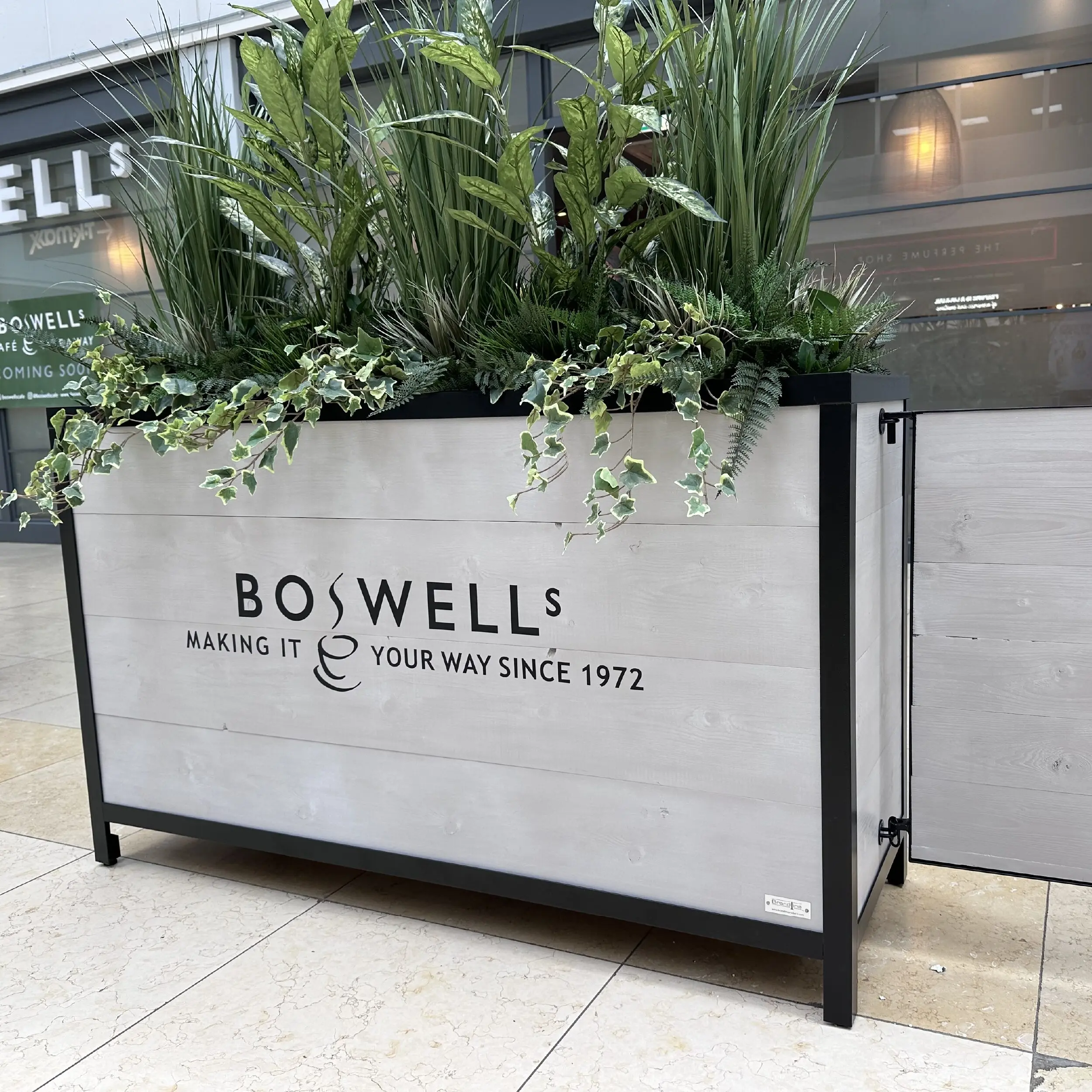 Boswells, Basingstoke - Baylis Industrial Cafe Planter Boswells Baylis Industrial Cafe Planters, Wooden Planters, Commercial Planters, Bespoke Planters, Planter with Trellis, Outdoor Planters, Hospitality Planters, Custom-Made Planters, Cafe Planters, Planters on Wheels, Moveable Planters, Black Ropes