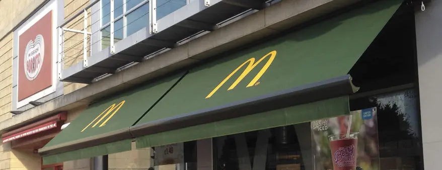 McDonalds Awning in Green with Yellow Logo McDonalds Traditional Awning in Green with Yellow Printed Logo. Custom Made & Bespoke Commercial Awnings with Valances.