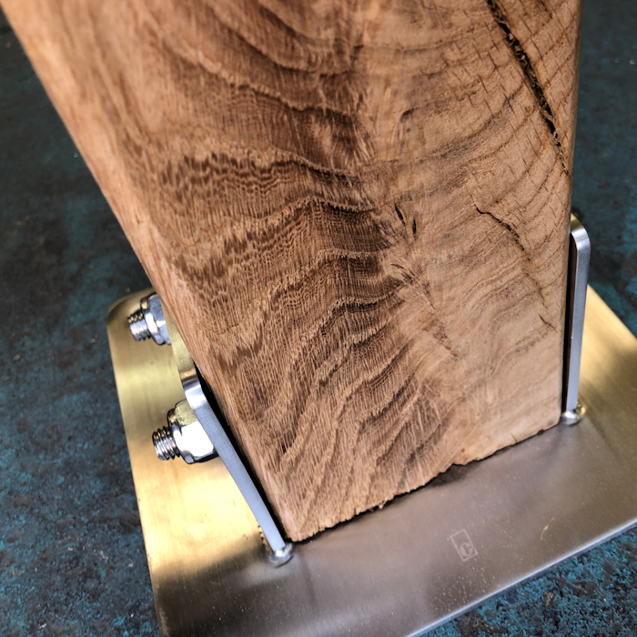 Close Up Bespoke Rustic Base Fitting for Coffee Cart Company Bespoke Rustic Oak Traditional Rope Barrier Post showing Custom Made Base Fitting for Coffee Cart Company's Decking.