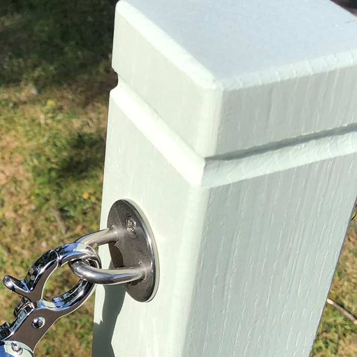 Rustic Rope Barrier Post Close Up Painted Light Green with Stainless Steel Wall Plates Painted Green Rustic Post with Square Base & Polyhemp Barrier Rope. For use with our Cafe Barrier Systems & Cafe Planters.