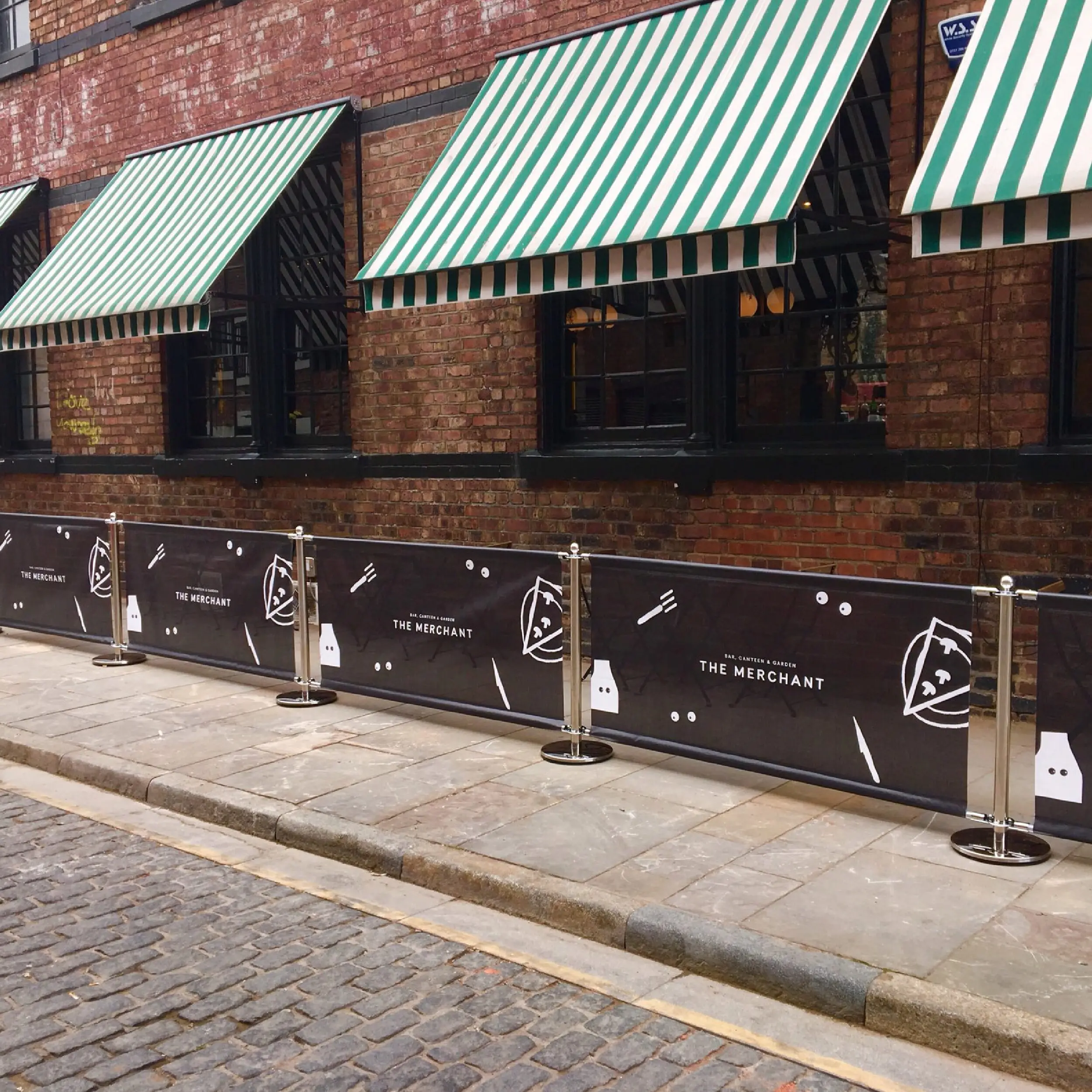 Classico Posts & Mesh Cafe Banners - The Merchant, Liverpool Classico Café Barrier Posts with PVC Mesh Café Banners at The Merchant