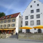 Caravita Samara & Big Ben Commercial Giant Umbrella in Yellow Outside Restaurant