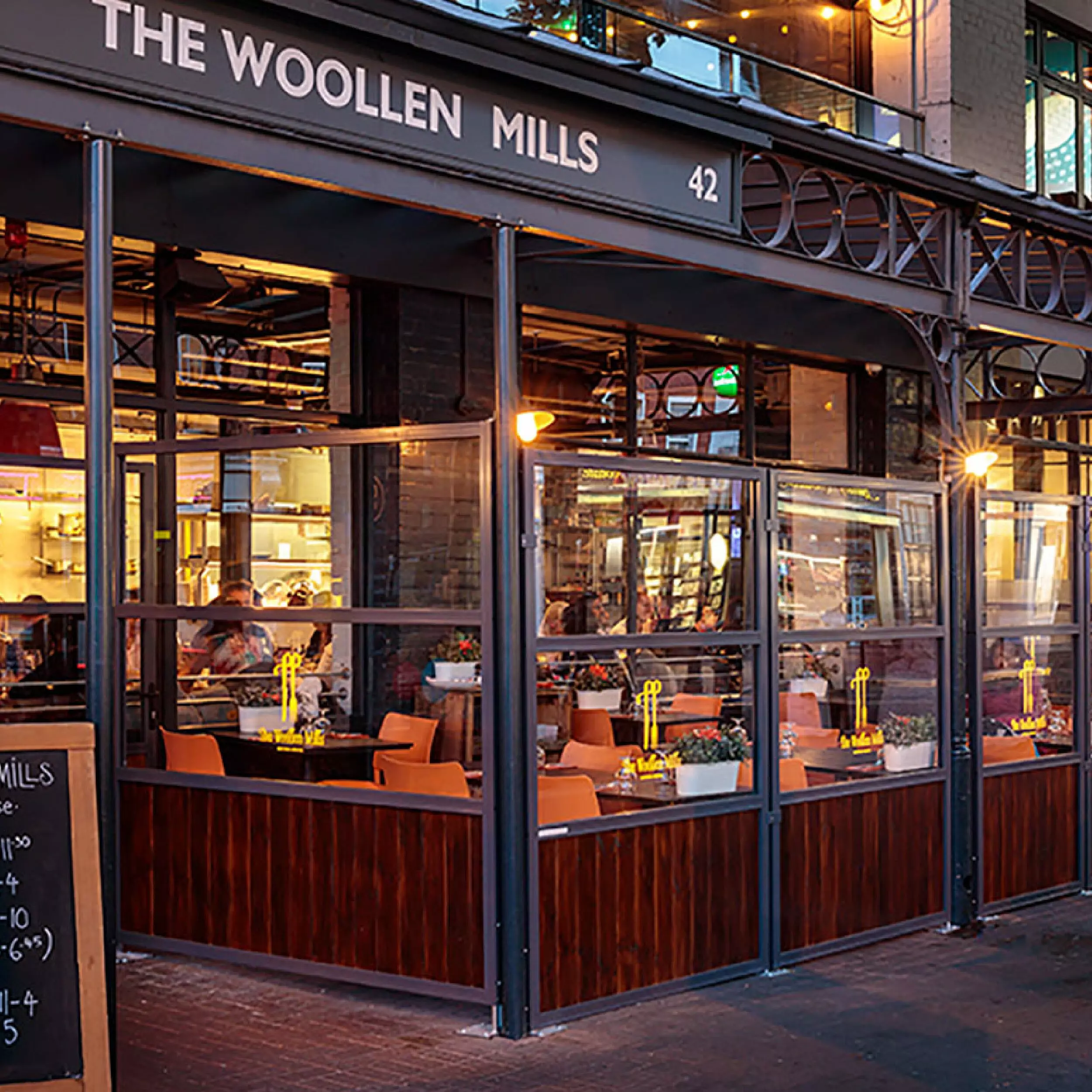 Buran Terrace Screen - The Woolen Mills Buran Terrace Screen - The Woollen Mills, Fixed Terrace Screens, Outdoor Screens, Powder Coated Screens, Restaurant Terrace Screens, Cafe Screens, Balustrades, Hospitality Terrace Screens, Windbreaks