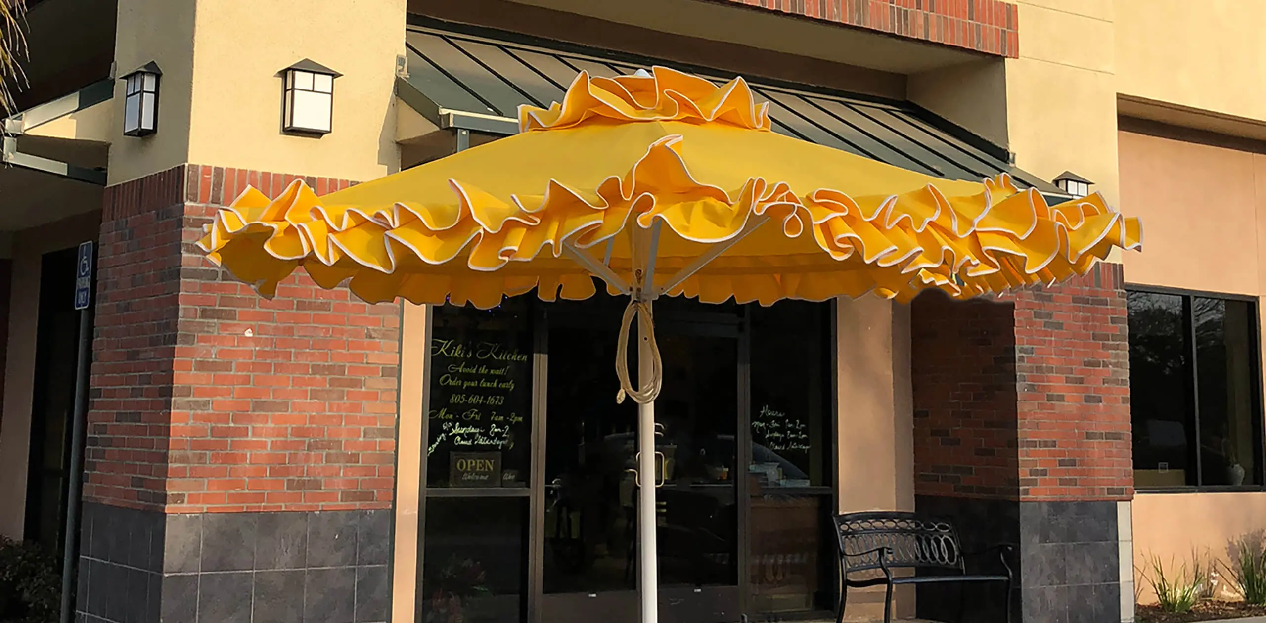 Yellow Petite Flamenco Giant Umbrella Petite Flamenco Giant Umbrella in Yellow Fabric with White Frilled Valance - Santa Barbara, Commercial Umbrellas, Commercial Giant Umbrellas, Restaurant Parasols, Hospitality Giant Umbrella, Pub Parasol