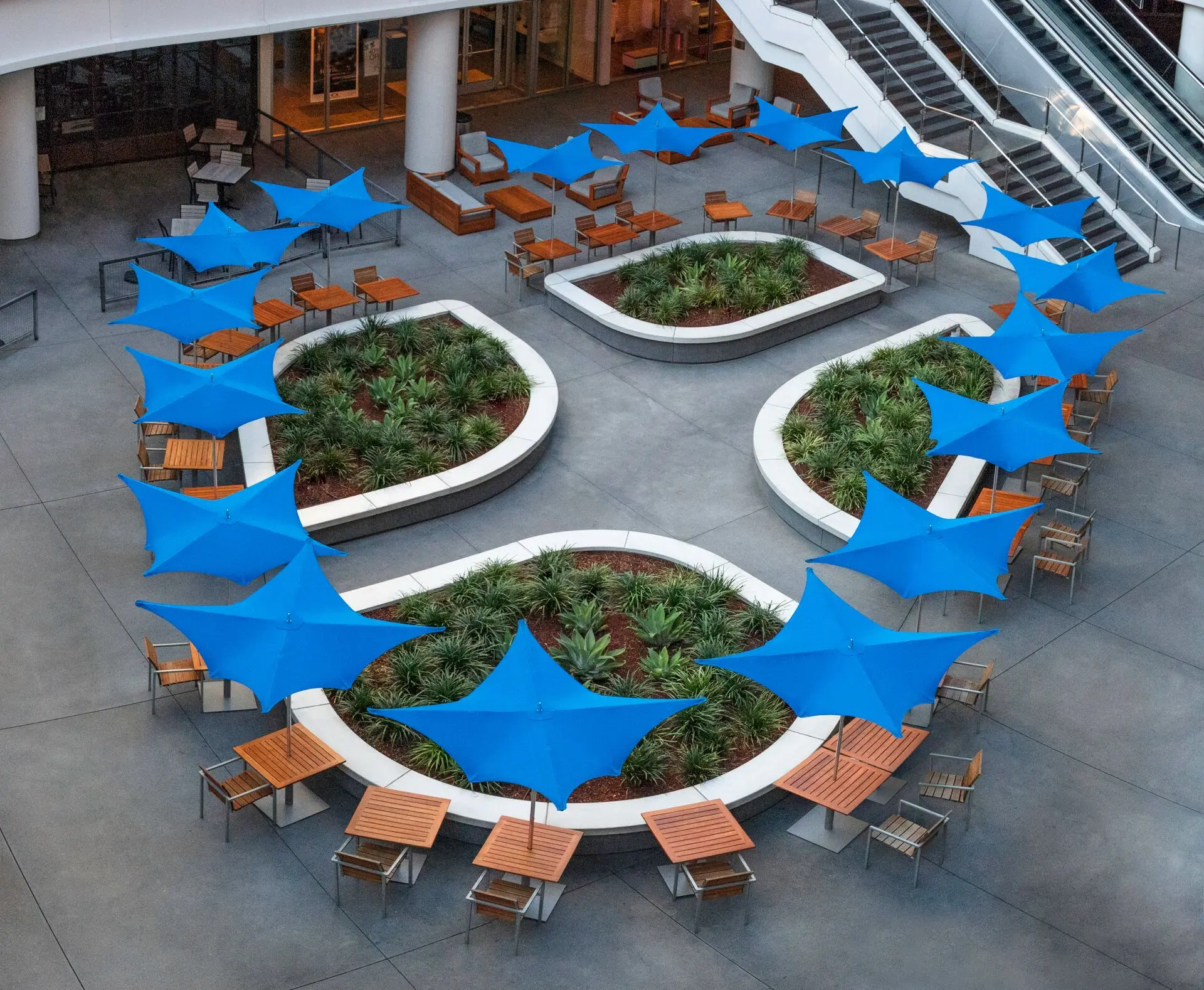 Blue OceanMaster M1 Manta Giant Umbrella Ocean Master M1 Manta Giant Umbrella in Blue Outside Restaurant Birds Eye View, Giant Umbrellas, Commercial Giant Umbrellas, Hospitality Giant Umbrellas, Parasols, Restaurant Umbrellas, Outdoor Umbrellas, Fabric Umbrellas, Giant Umbrellas with Logos, Tuuci Umbrellas, Tuuci Giant Umbrellas