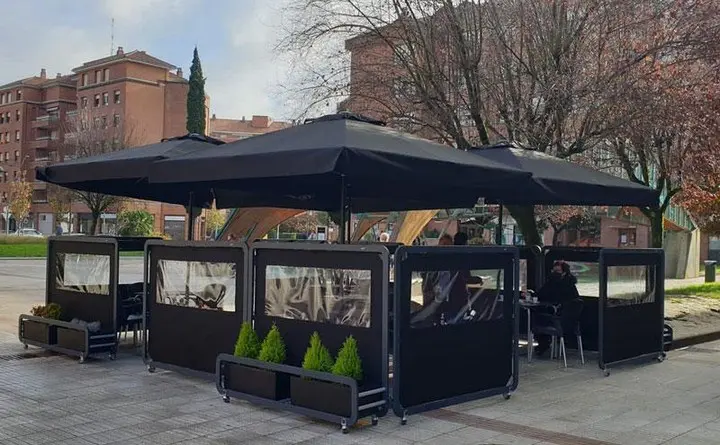 Siena Maxi Industrial Café Planter in Black with Olefin Fabric Screens and Planter Boxes in Black Outside Siena Maxi Industrial Café Planter in Black with Olefin Fabric Screens and Planter Boxes in Black Outside, Cafe Planters, Restaurant Planters, Industrial Cafe Planters, Cafe Screens, Outdoor Cafe Planters, Bespoke Planters, Planters with Screens, Commercial Planters, Commercial Cafe Planters, Hospitality Cafe Planters