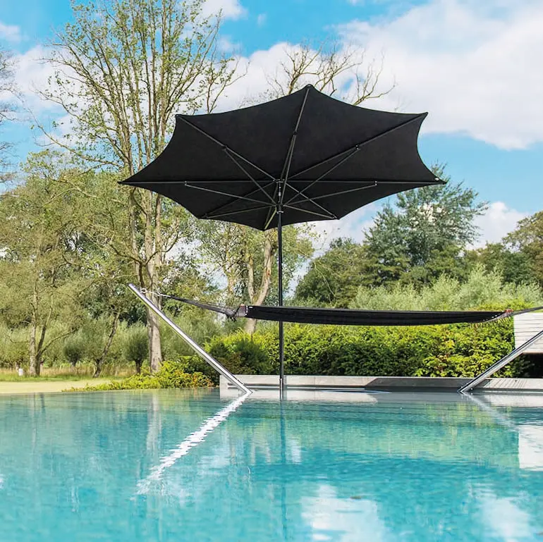 Black Tuuci OceanMaster M1 Razor Giant Umbrella OceanMaster M1 Razor Giant Umbrella in Black by the Pool, Giant Umbrellas, Commercial Giant Umbrellas, Hospitality Giant Umbrellas, Parasols, Restaurant Umbrellas, Outdoor Umbrellas, Fabric Umbrellas, Giant Umbrellas with Logos, Tuuci Umbrellas, Tuuci Giant Umbrellas