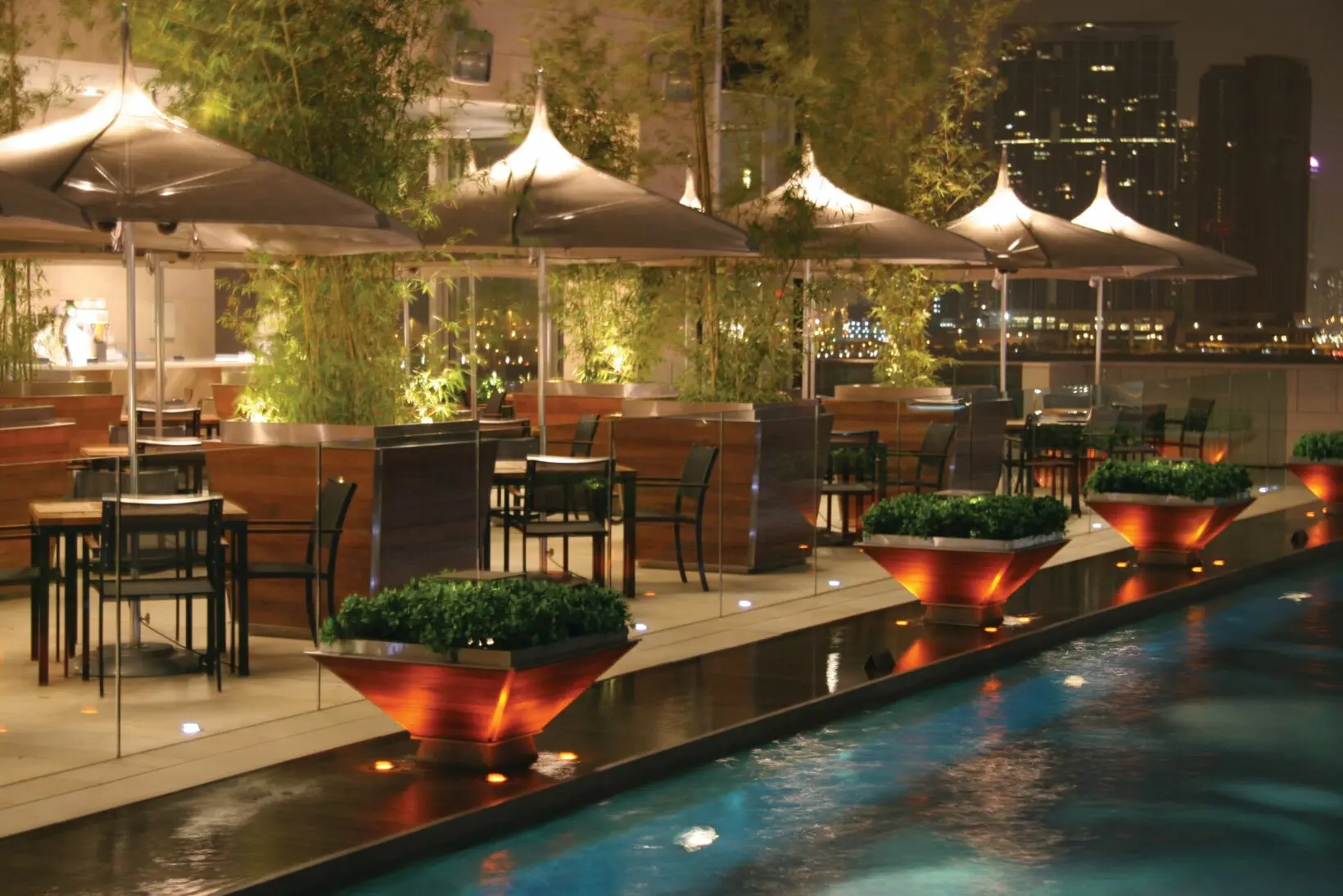 Tuuci OceanMaster M1 Pagoda in a Restaurant Tuuci OceanMaster M1 Pagoda Giant Umbrella in a Restaurant Setting, Giant Umbrellas, Commercial Giant Umbrellas, Hospitality Giant Umbrellas, Parasols, Restaurant Umbrellas, Outdoor Umbrellas, Fabric Umbrellas, Giant Umbrellas with Logos, Tuuci Umbrellas, Tuuci Giant Umbrellas