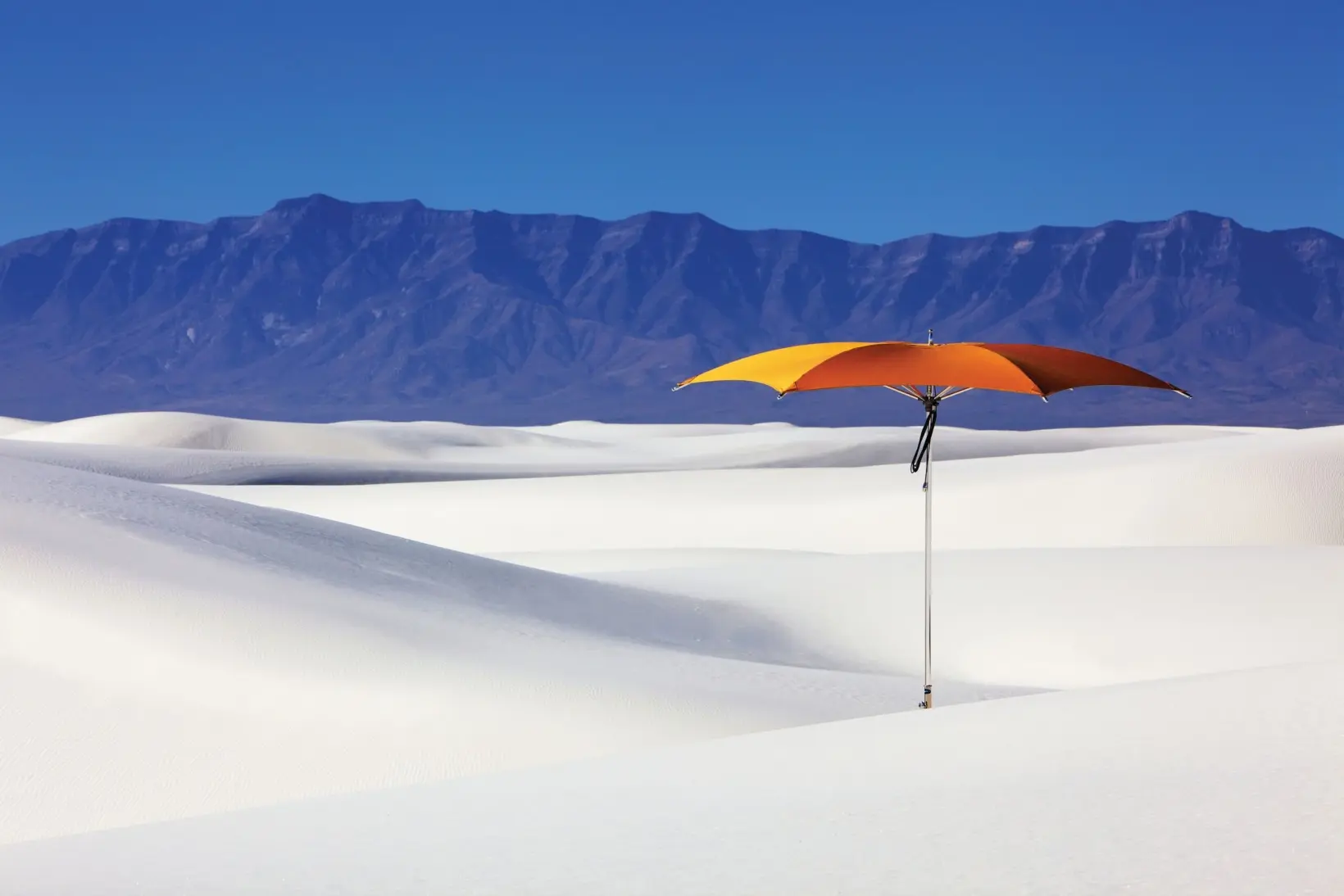 Tuuci OceanMaster M1 Crescent Giant Umbrella in Orange Tuuci OceanMaster M1 Crescent Giant Umbrella in Orange in a Snowy Setting, Giant Umbrellas, Commercial Giant Umbrellas, Hospitality Giant Umbrellas, Parasols, Restaurant Umbrellas, Outdoor Umbrellas, Fabric Umbrellas, Giant Umbrellas with Logos, Tuuci Umbrellas, Tuuci Giant Umbrellas