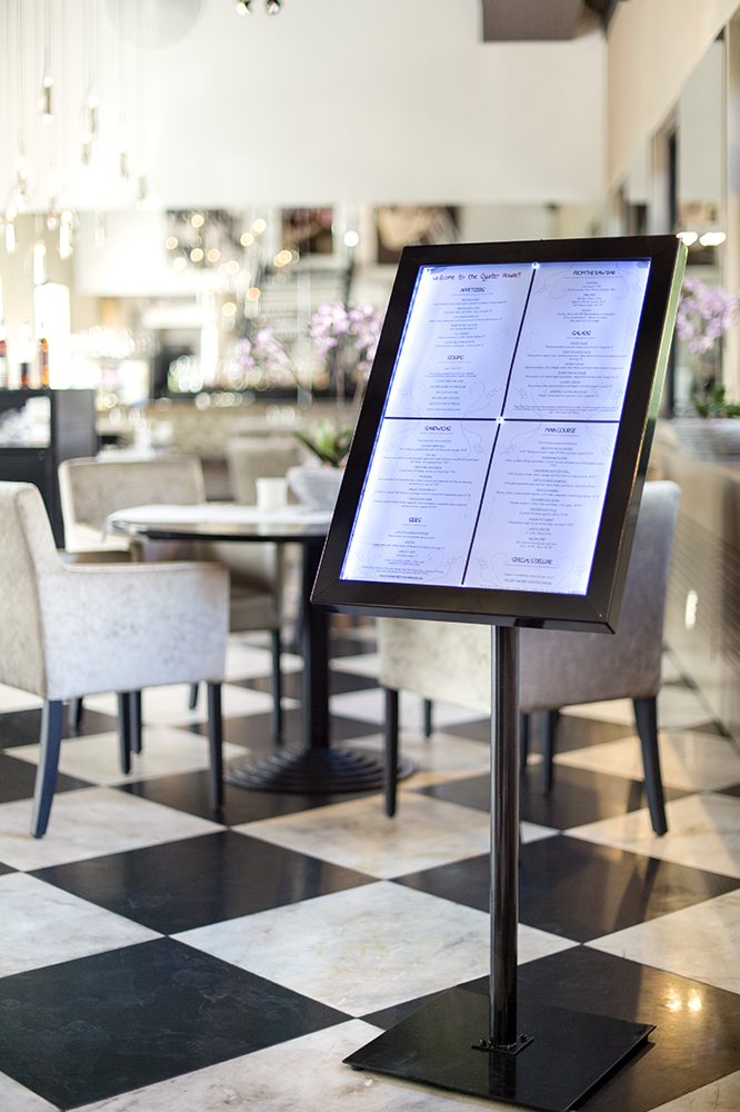 Seren XL Black LED Menu Display Stand inside a Cafe Seren XL Black LED Menu Display Stand inside a Cafe, Menu Stands, Menu Display Stands, LED Menu Stands, Freestanding Menu Stands, Outdoor Menu Stands