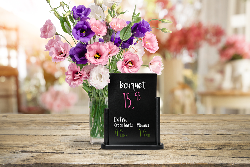 Flat Top Table Board in Black on a Wooden Table next to a Vase of Flowers Flat Top Table Board in Black on a Wooden Table next to a Vase of Flowers, Table Chalkboard, Freestanding Table Board, Wooden Table Board, Double Sided Table Chalkboard, Table Top Accessory, Advertising Boards, Restaurant Signage, Cafe Signage, Menu Boards, Menu Signage