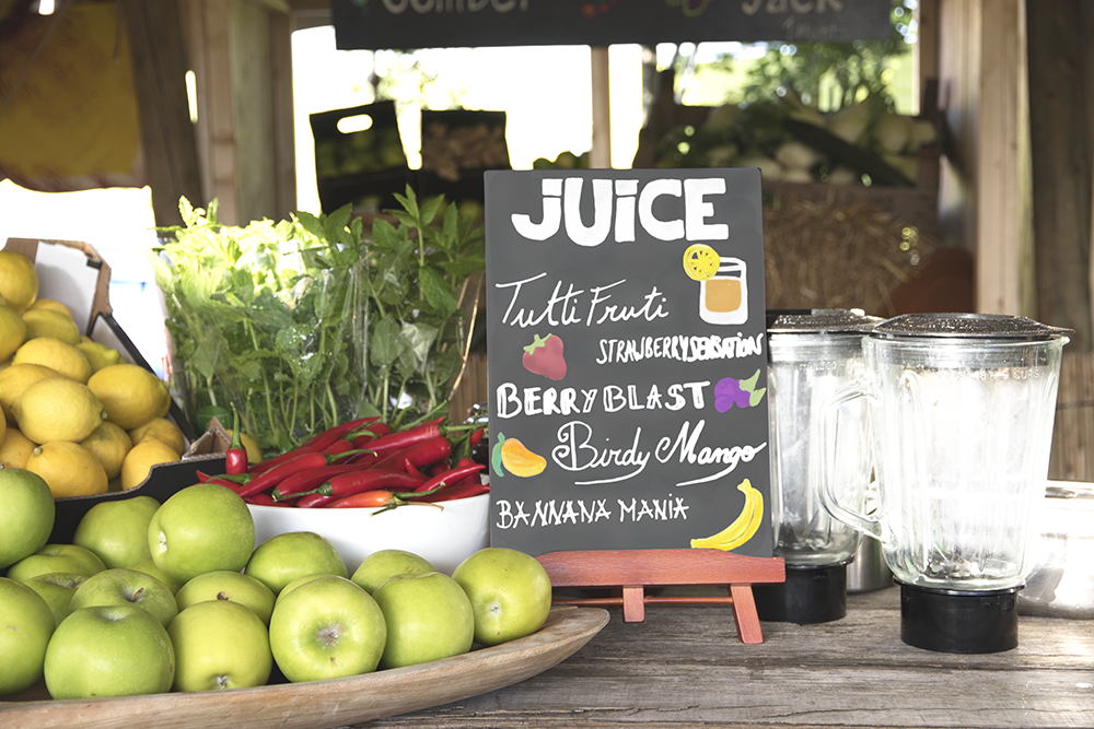 Junior Table Board in Mahogany in a Juice Bar Junior Table Board in Mahogany in a Juice Bar, Table Chalkboard, Freestanding Table Board, Wooden Table Board, Double Sided Table Chalkboard, Table Top Accessory, Advertising Boards, Restaurant Signage, Cafe Signage, Menu Boards, Menu Signage
