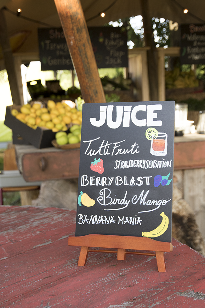 Junior Table Board in Mahogany in a Juice Bar Junior Table Board in Mahogany in a Juice Bar, Table Chalkboard, Freestanding Table Board, Wooden Table Board, Double Sided Table Chalkboard, Table Top Accessory, Advertising Boards, Restaurant Signage, Cafe Signage, Menu Boards, Menu Signage