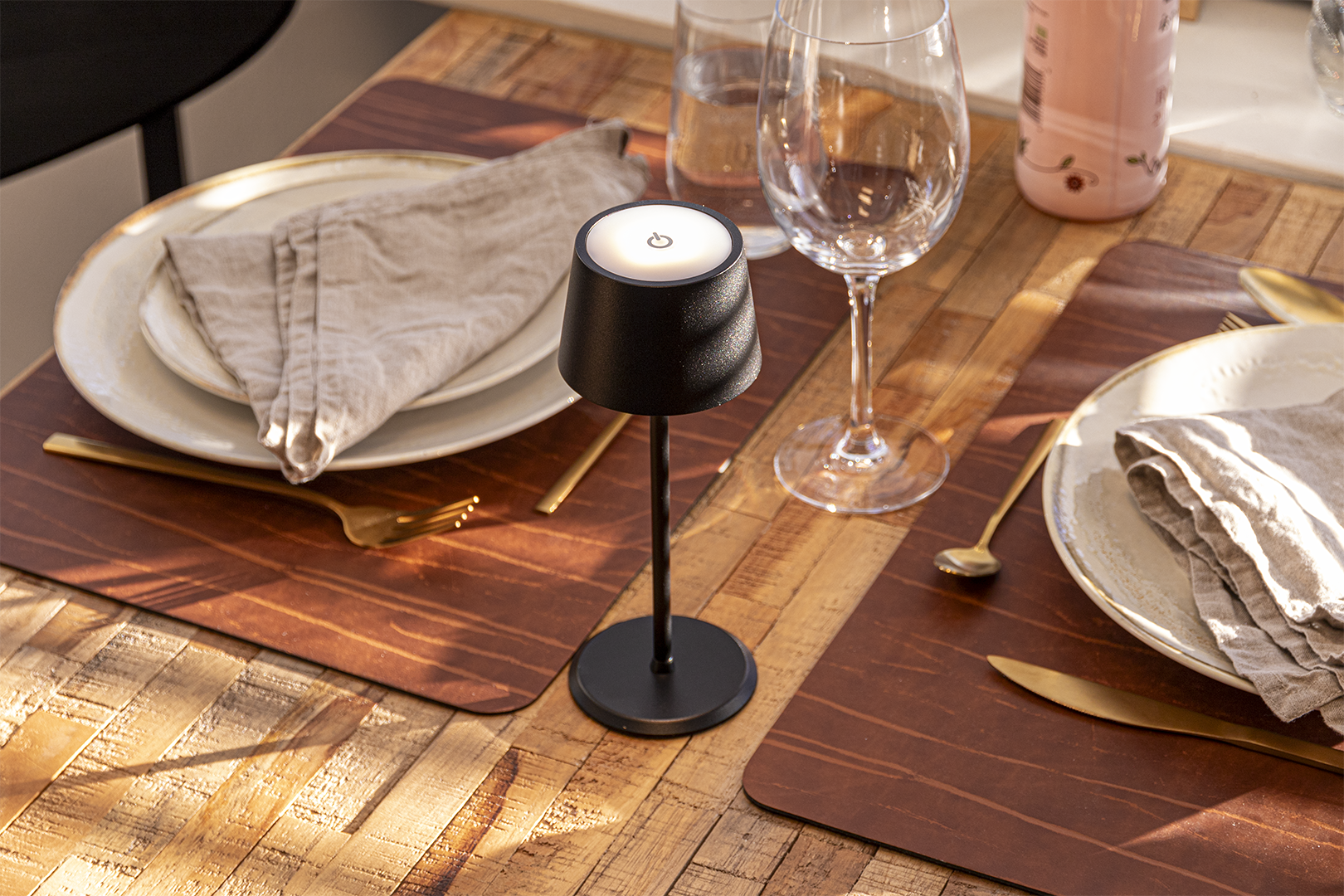 Monaco Rechargeable Table Lamp in Black on a Wooden Table Inside a Restaurant in the Sunshine Monaco Rechargeable Table Lamp in Black on a Wooden Table Inside a Restaurant in the Sunshine, Table Lighting, Restaurant Lighting, Lighting for Table at Restaurant, Commercial Table Lighting, Hospitality Lighting, Rechargeable Table Lamps, LED Lighting, Outdoor Table Lamps, Indoor Table Lighting, Cafe Lighting, Table Lamps for Cafes