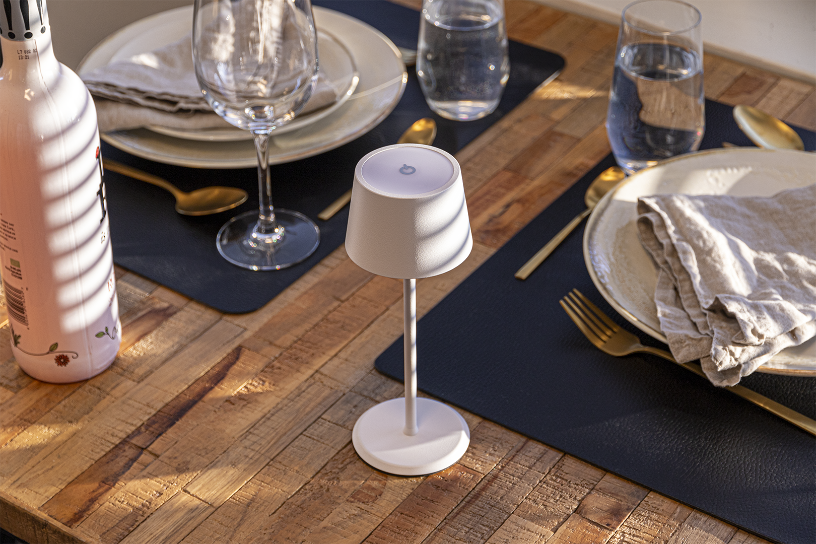 Monaco Rechargeable Table Lamp in White on a Wooden Table Inside a Restaurant Monaco Rechargeable Table Lamp in White on a Wooden Table Inside a Restaurant, Table Lighting, Restaurant Lighting, Lighting for Table at Restaurant, Commercial Table Lighting, Hospitality Lighting, Rechargeable Table Lamps, LED Lighting, Outdoor Table Lamps, Indoor Table Lighting, Cafe Lighting, Table Lamps for Cafes