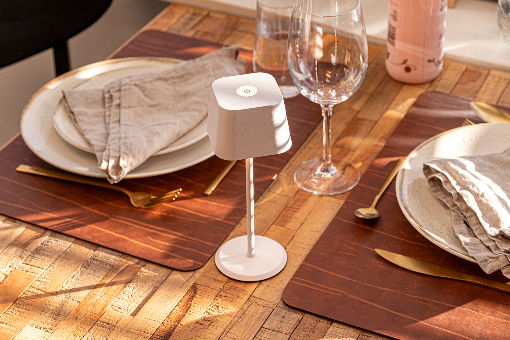 Valletta Rechargeable Table Lamp in White on a Wooden Table Inside a Restaurant Valletta Rechargeable Table Lamp in White on a Wooden Table Inside a Restaurant, Table Lighting, Restaurant Lighting, Lighting for Table at Restaurant, Commercial Table Lighting, Hospitality Lighting, Rechargeable Table Lamps, LED Lighting, Outdoor Table Lamps, Indoor Table Lighting, Cafe Lighting, Table Lamps for Cafes