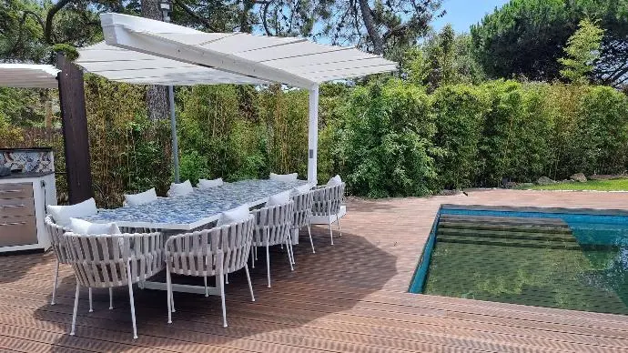Folium in White next to a Pool Folium Free Standing Patio Heater, Folium Patio Heater in Black and Fabric, Patio Heaters, Outdoor Heaters, Free Standing Patio Heater, Alfresco Heaters, Commercial Heaters, Commercial Patio Heaters, Free Standing Heating, Hospitality Heaters, Restaurant Heaters