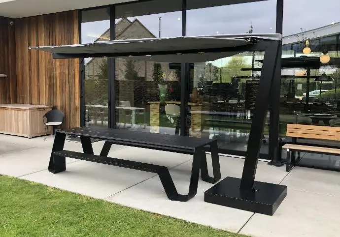 Black Metal Table & Benches under a Folium Patio Heater Folium Free Standing Patio Heater, Folium Patio Heater in Black with Grey Fabric, Patio Heaters, Outdoor Heaters, Free Standing Patio Heater, Alfresco Heaters, Commercial Heaters, Commercial Patio Heaters, Free Standing Heating, Hospitality Heaters, Restaurant Heaters