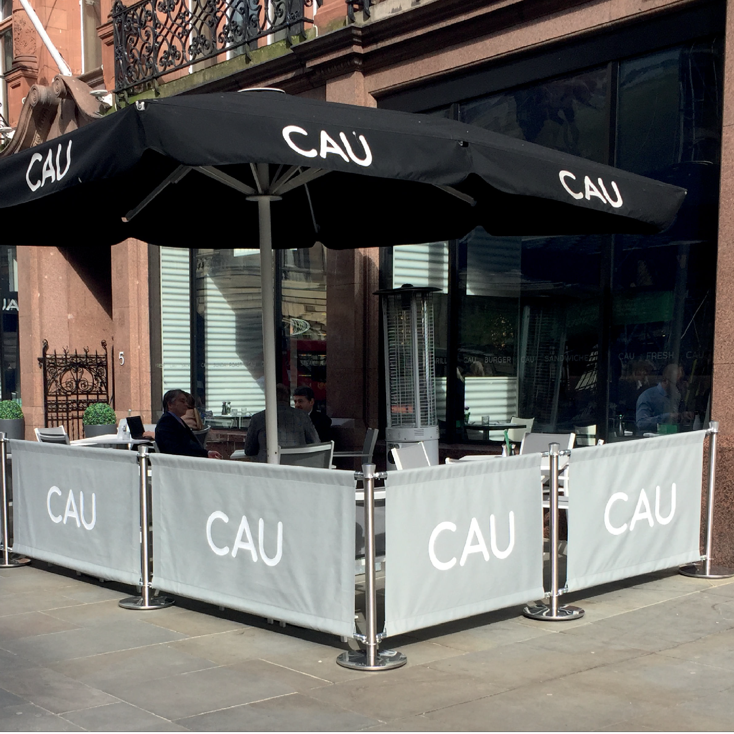 CAU - Original Cafe Barrier Posts & Canvas Cafe Banners CAU Cafe Barrier System, printed café banners, bespoke café banners, handmade café banners, custom café banners, café screens, fabric café banners, original cafe barrier posts, stainless steel cafe barrier posts, metal stanchions, cafe screens