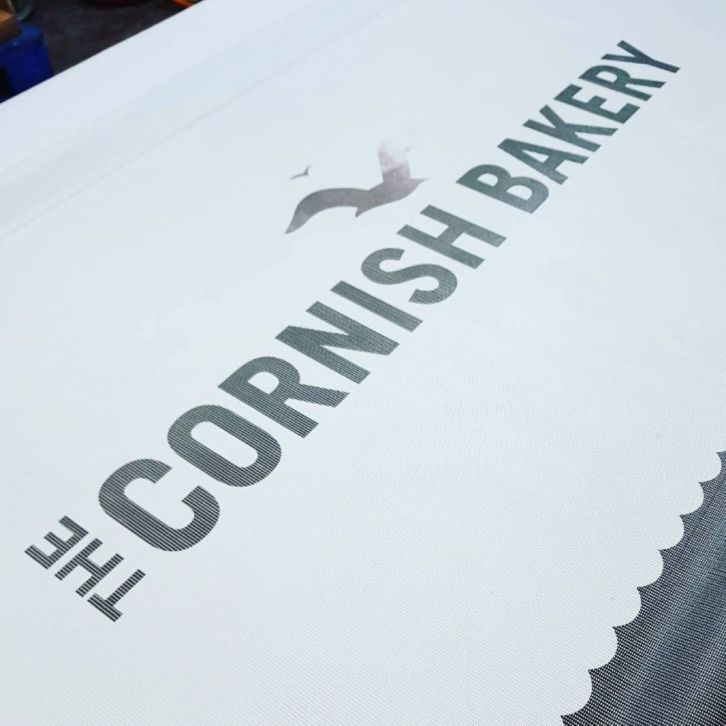 Cornish Bakery - Mesh Cafe Banner Cornish Bakery PVC Mesh Printed Cafe Banner, Bespoke Cafe Banners, Alfresco Cafe Panels, PVC Mesh Panels, Restaurant Panels, Commercial Cafe Panels, Custom Made PVC Mesh Panels, Digitally Printed Banners